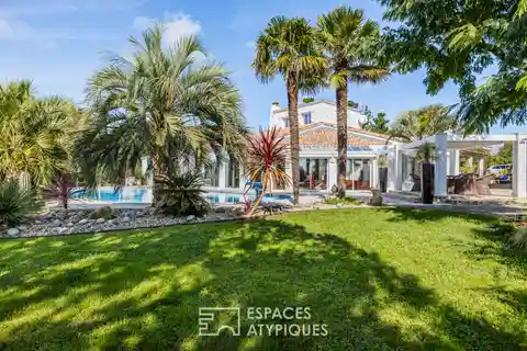 Contemporary Palm-Lined Villa with Infinity Pool