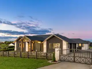 North-Facing Brick Estate with Triple Garage
