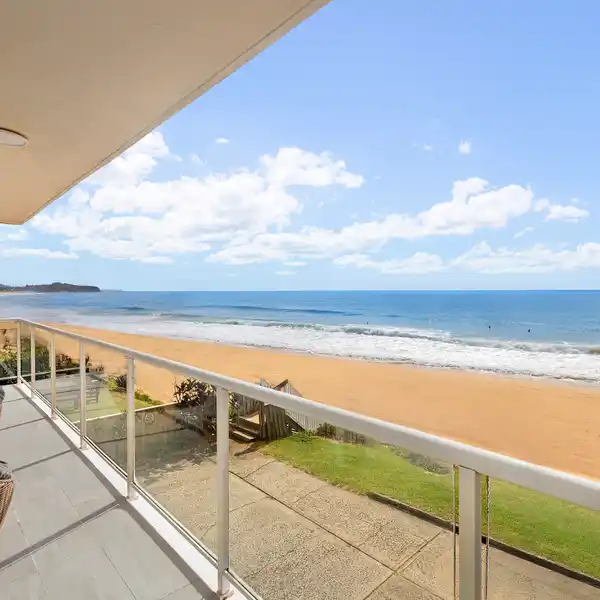 BEACHFRONT ELEGANCE WITH UNINTERRUPTED OCEAN VISTAS