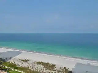 Turnkey Beachfront Condo with Designer Finishes