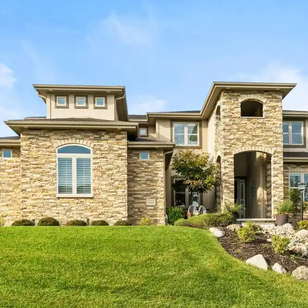 GRAND CUSTOM HOME WITH EXCEPTIONAL ENTERTAINING SPACES