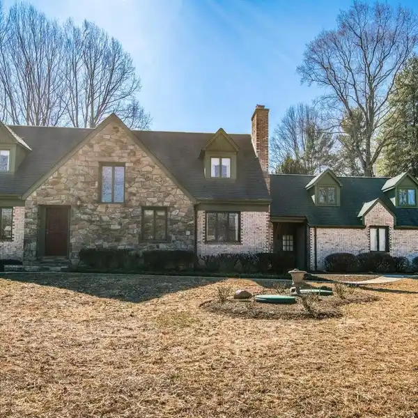 CUSTOM COLONIAL WITH LUSH PRIVATE GROUNDS