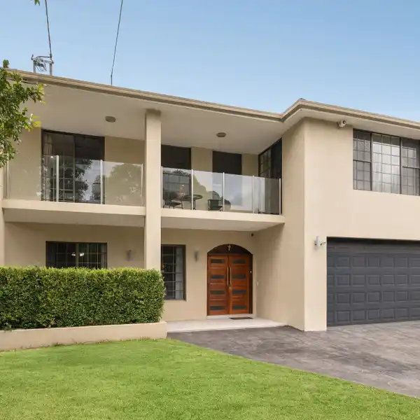 METICULOUSLY MAINTAINED FULL BRICK RESIDENCE