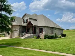 Custom Home in the Prestigious Olde Stone Golf Course Community