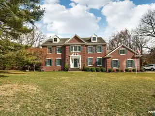 Custom Brick-front Center Hall Colonial