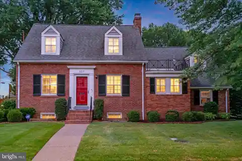 Cape Cod Charm with Designer Kitchen and Sunroom