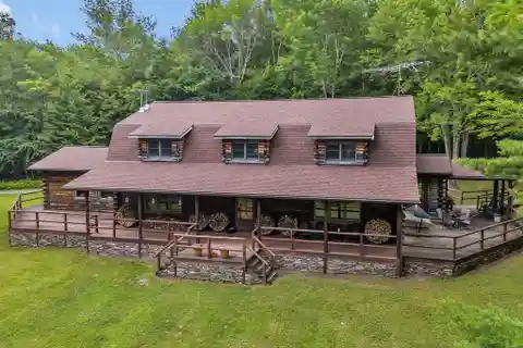 Two Unique Secluded Log Homes on 50 Acres
