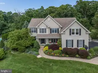 Meticulously Updated Colonial with Gourmet Kitchen & Gym