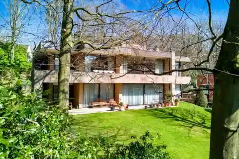 Charming Residence in a Wooded Setting