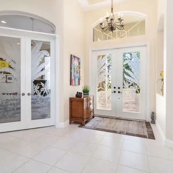 CUSTOM HOME ON A LUSH PRIVATE ACRE IN BAY HILL ESTATES