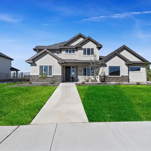IMPECCABLE HOME ON A PICTURESQUE LOT