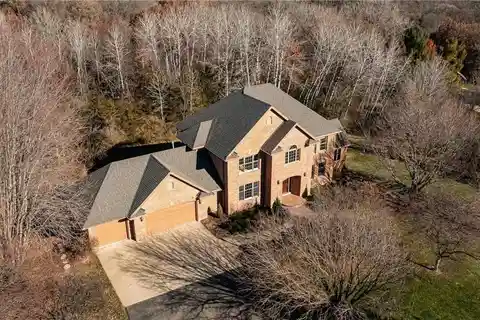 Lovely Home Located on a Private Wooded Lot