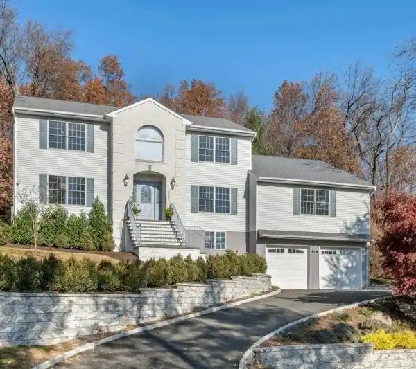 STUNNING CUSTOM-BUILT COLONIAL HOME
