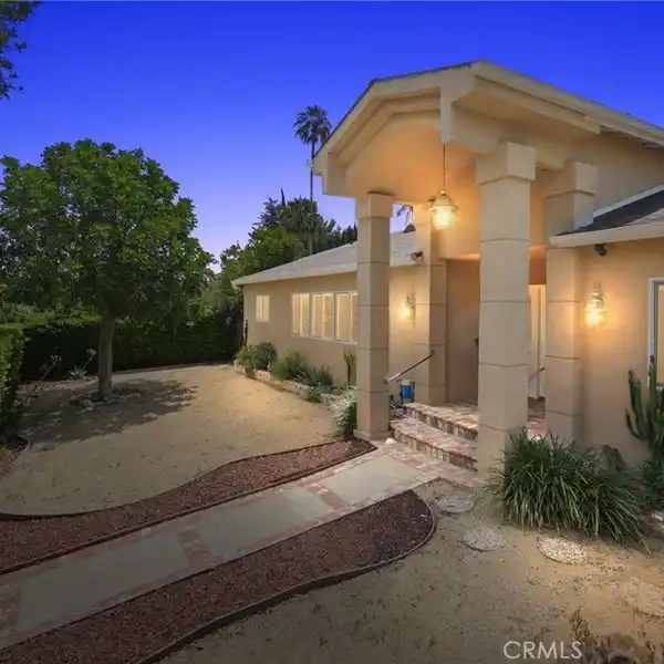 EXQUISITE SINGLE-STORY HOME ON A CORNER LOT