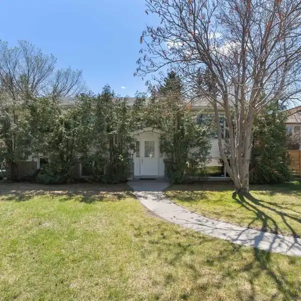 UNIQUE OPPORTUNITY ON A LARGE CORNER LOT