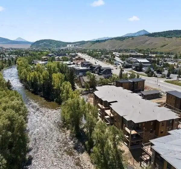 RIVERFRONT CORNER UNIT WITH TWO DECKS