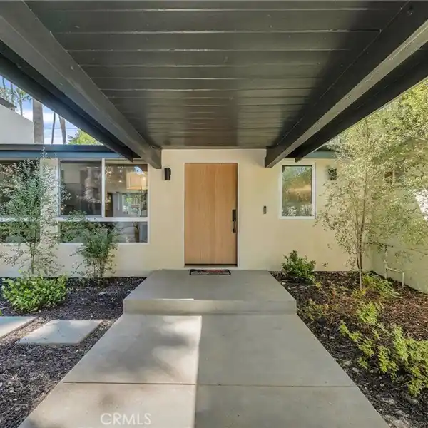 BEAUTIFULLY REIMAGINED MID-CENTURY MODERN POOL HOME