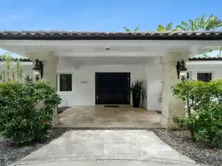 Elevated Living in Gated One-Acre Pinecrest Estate