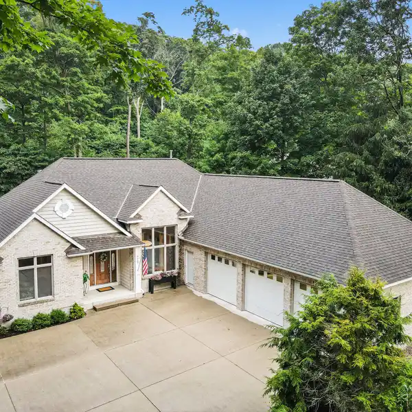 CUSTOM HOME WITH DEEDED LAKE MICHIGAN ACCESS