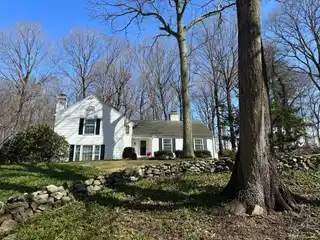 Timeless Elegance and Modern Comfort on Nearly Four Acres