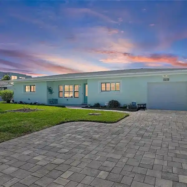 MOVE-IN READY WATERFRONT RANCH-STYLE POOL HOME