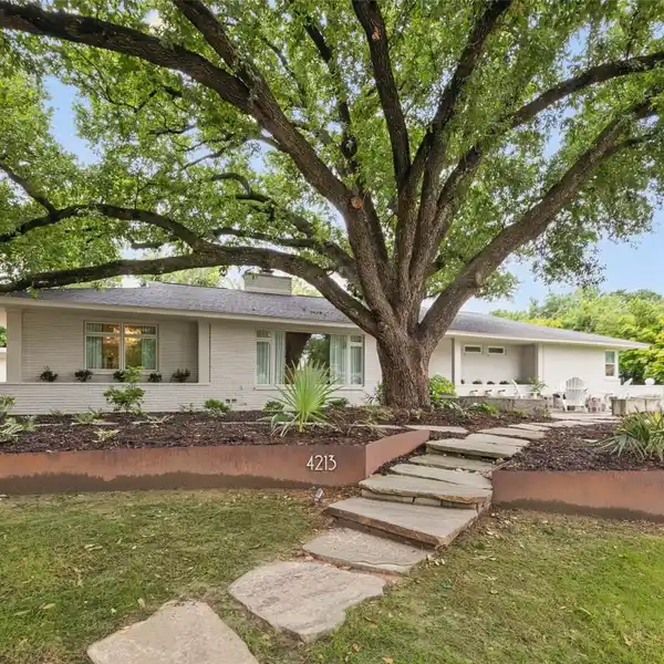 STUNNING MIDCENTURY RETREAT IN COVETED LOCATION
