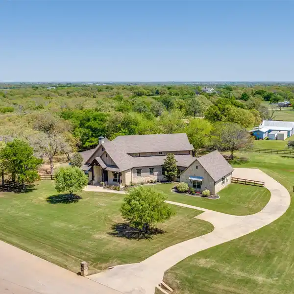 IMMACULATELY MAINTAINED CUSTOM HOME ON TWO ACRES