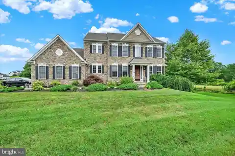 Stunning Stone Colonial with Open-Concept Living