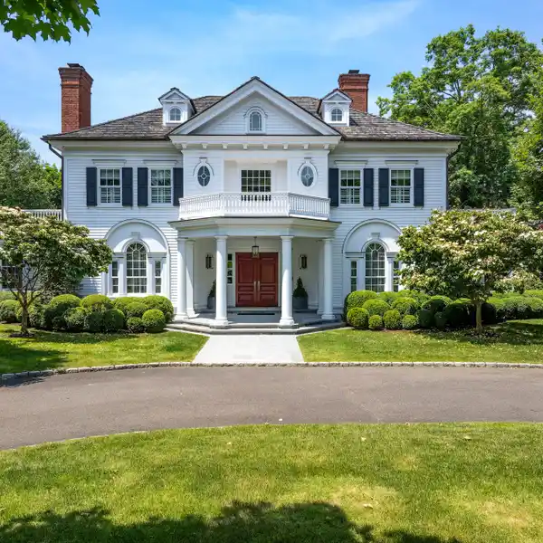 STUNNING COLONIAL ON MANICURED PROPERTY