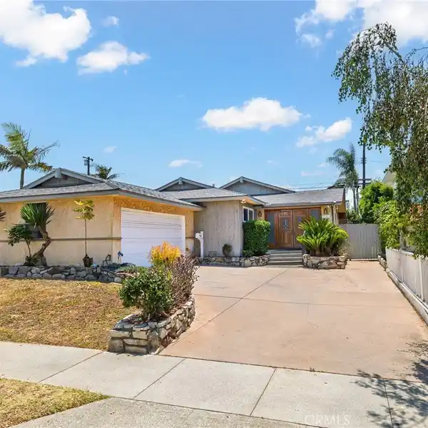 CHARMING CUSTOM HOME IN A QUIET NEIGHBORHOOD