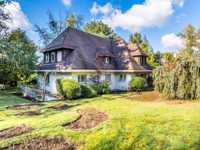 OPPORTUNITY TO RENOVATE A HOME IN A LUSH SETTING