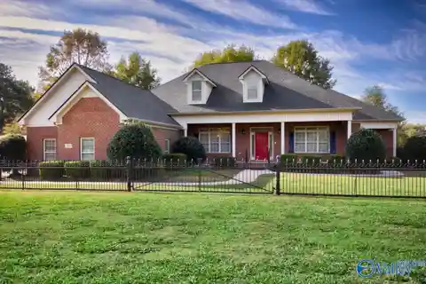 Elegant Brick Estate with Serene Acreage and Luxury Touches