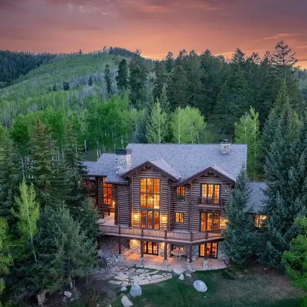 CAPTIVATING LOG HOME ON 15 ACRES
