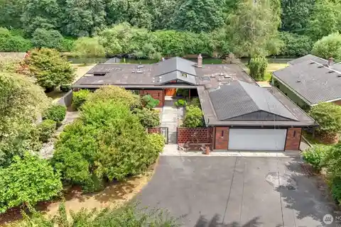 Riverfront Mid-century Gem with Timeless Style