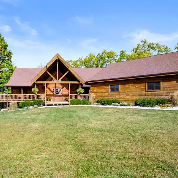 EXCEPTIONAL LOG CABIN ON 24 ACRES
