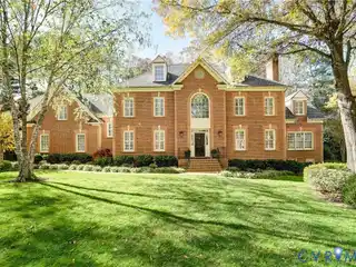Sophisticated Home with Large Arched Picture Window
