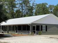 CUSTOM-BUILT STUNNER OFFERS PEACEFUL ESCAPE TO THE COUNTRY