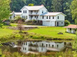 Redesigned Farmhouse Retreat on 20 Scenic Acres
