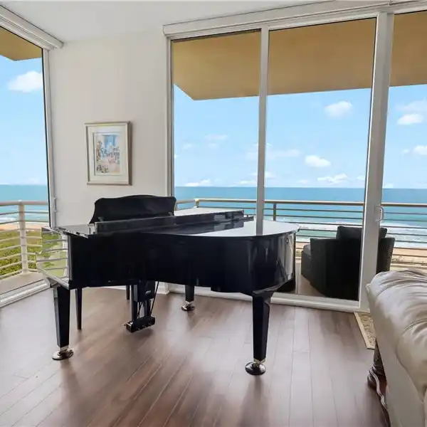 TOP-FLOOR CORNER UNIT IN BOUTIQUE BUILDING