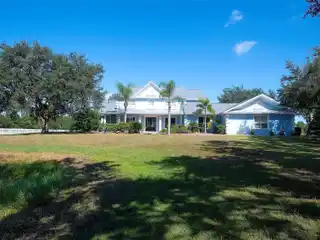 Gated Luxury Home with Oak-Lined Driveway