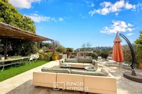 Contemporary Gem with Solarium and Garden Views