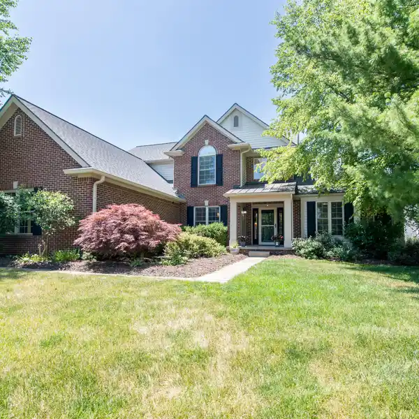 STUNNING CUSTOM HOME WITH 3-CAR GARAGE