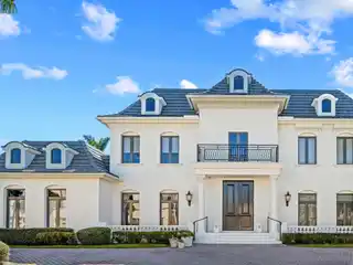 Exquisite Custom Home Nestled in the Heart of Boca Grove Plantation