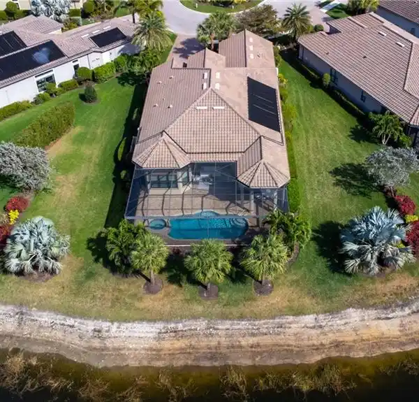 IMPECCABLY MAINTAINED HOME WITH EXPANSIVE LAKE VIEWS