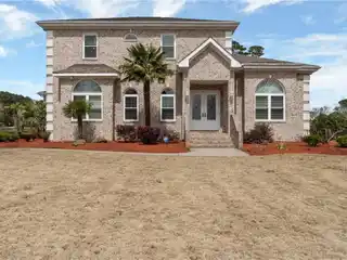 Magnificent Home in Sought After Heron Ridge Estates