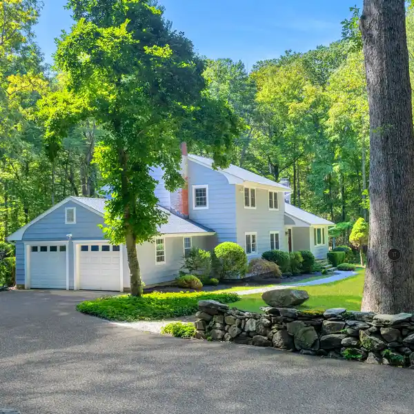 TURN-KEY COLONIAL ON A SERENE ROAD