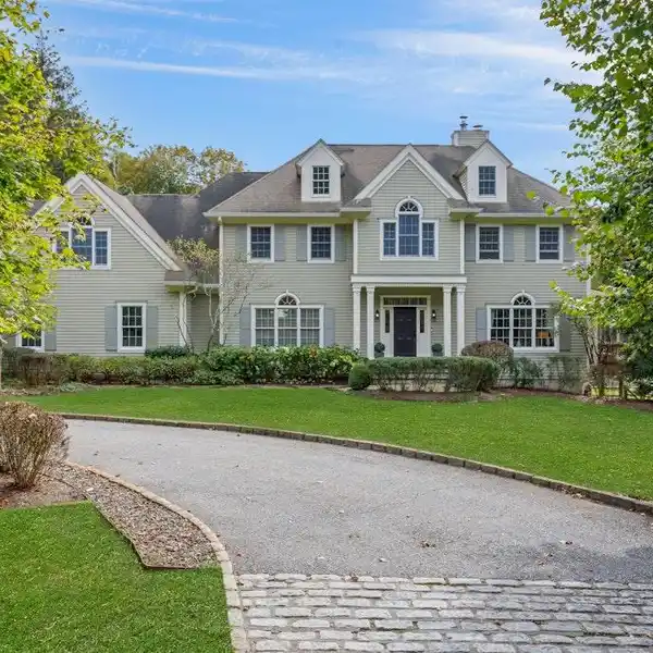 BEAUTIFUL HOME ON EXPANSIVE LEVEL ACREAGE