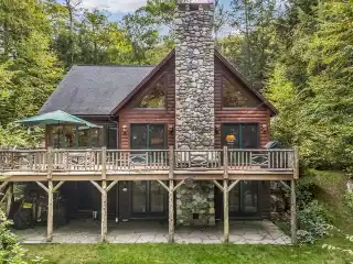 Rare Log Home on Great Pond