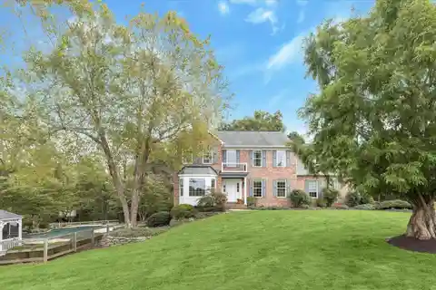 Breathtaking Brick Colonial on over Three Acres