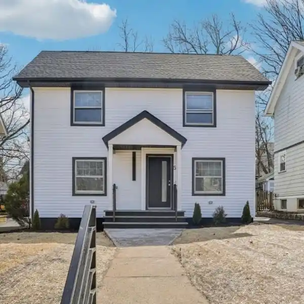 CHARMING EXPANDED COLONIAL HOME